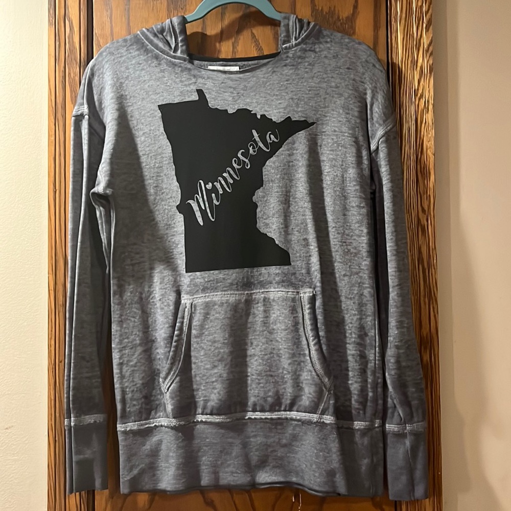 Maurice’s light blue sweatshirt